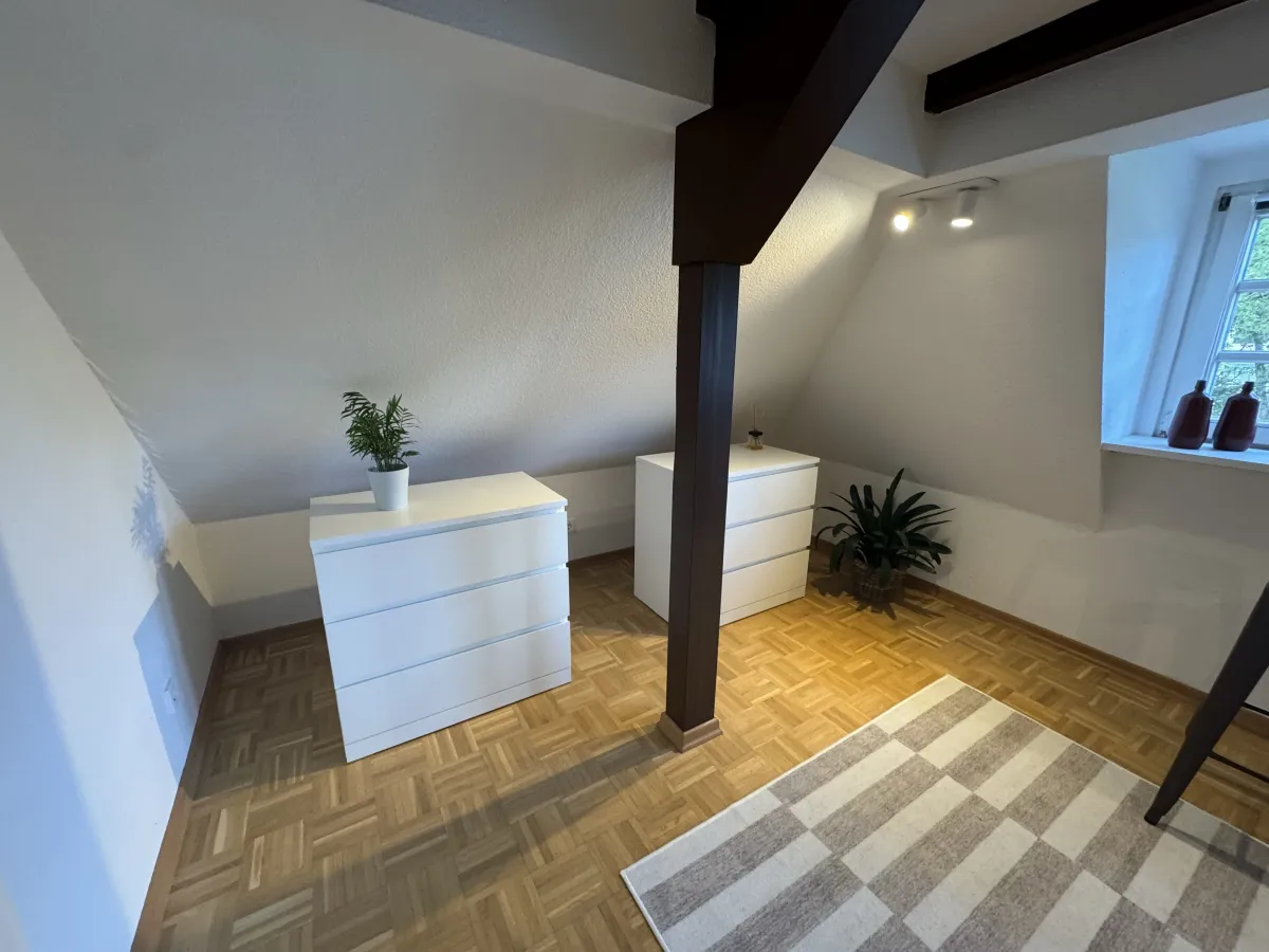 Bedroom with storage and wooden beam detail