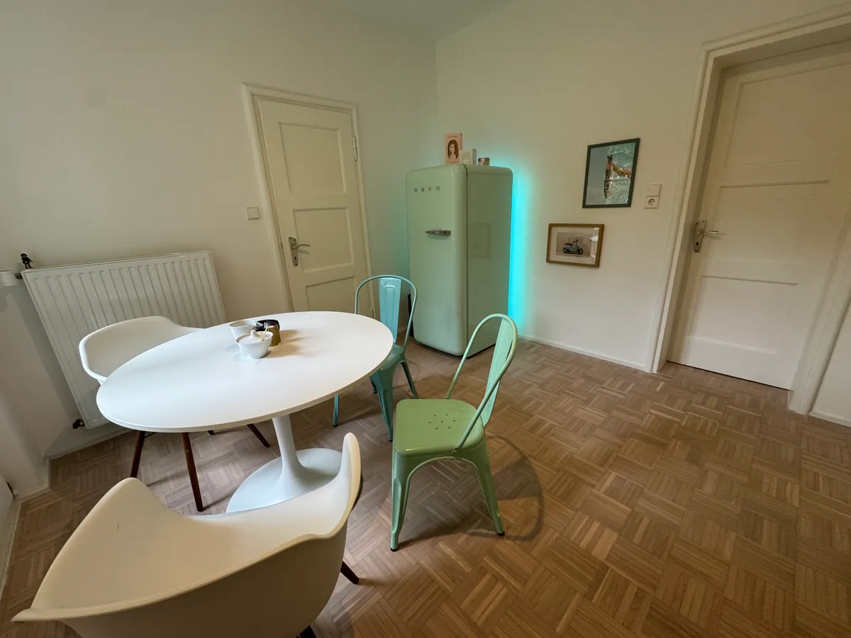 Kitchen counter with oven, kettle and coffee machine